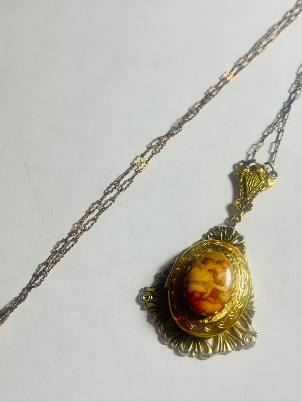 Gold Cameo Pendant Necklace with Amber-Tone Center